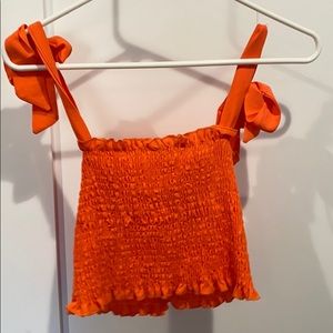 Orange crop top